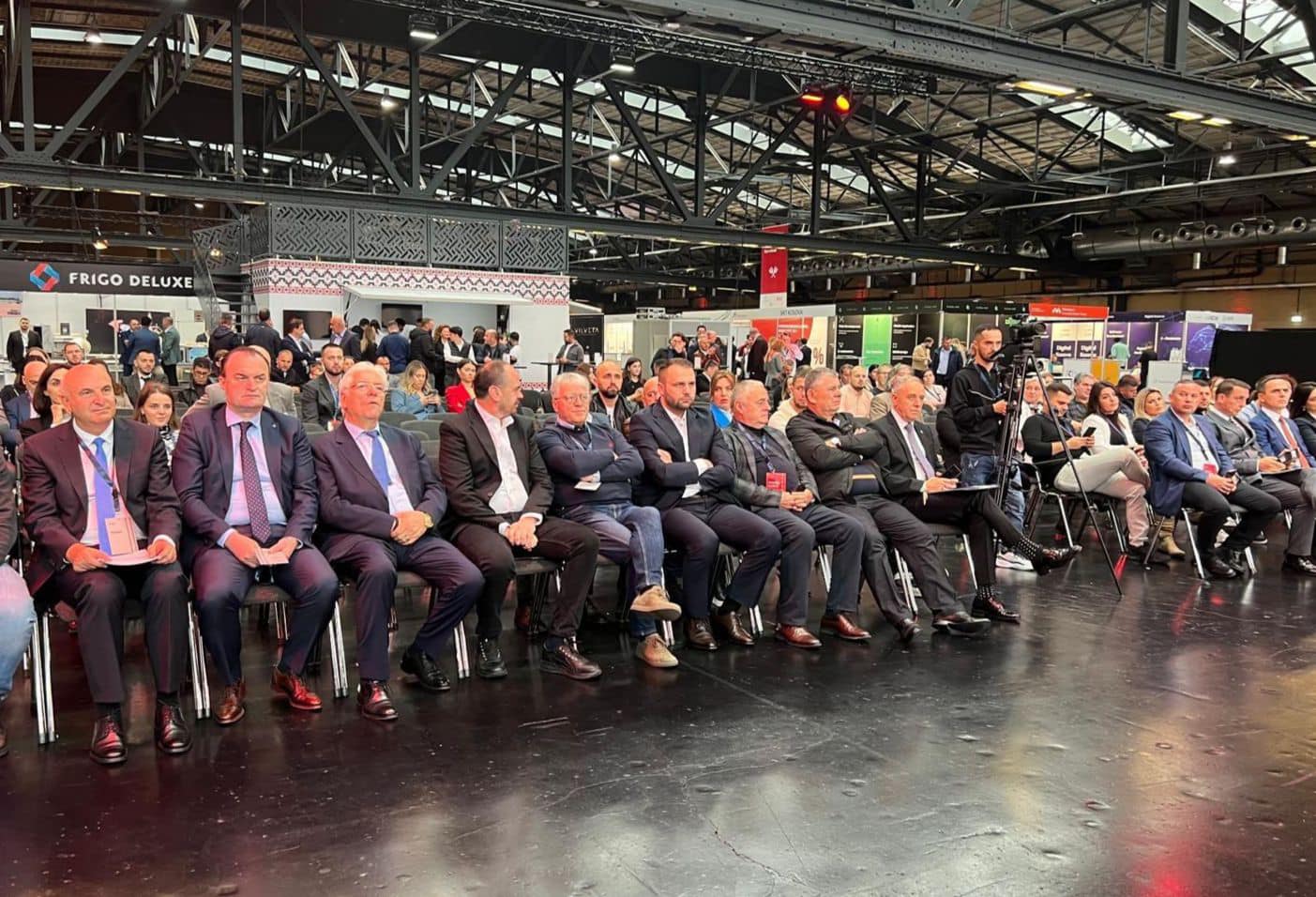 May be an image of 2 people, crowd and text