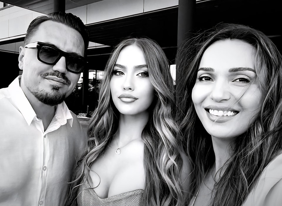 May be a black-and-white image of 3 people, people smiling and text